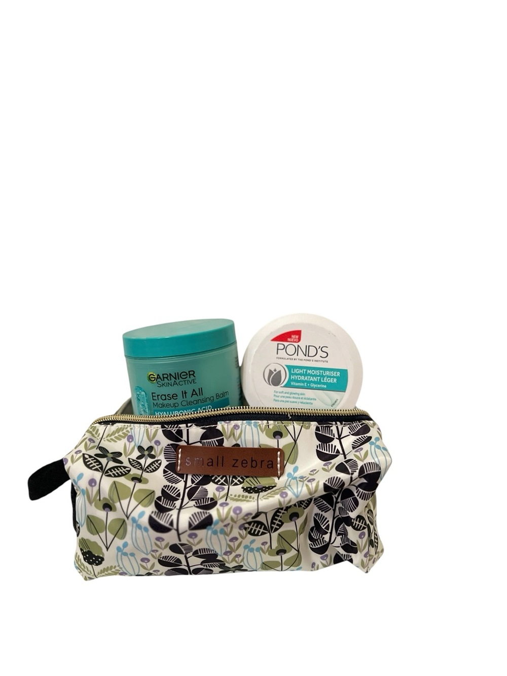3 Piece - Small Zebra Floral Cosmetic Bag with Garnier & Pond's Skincare